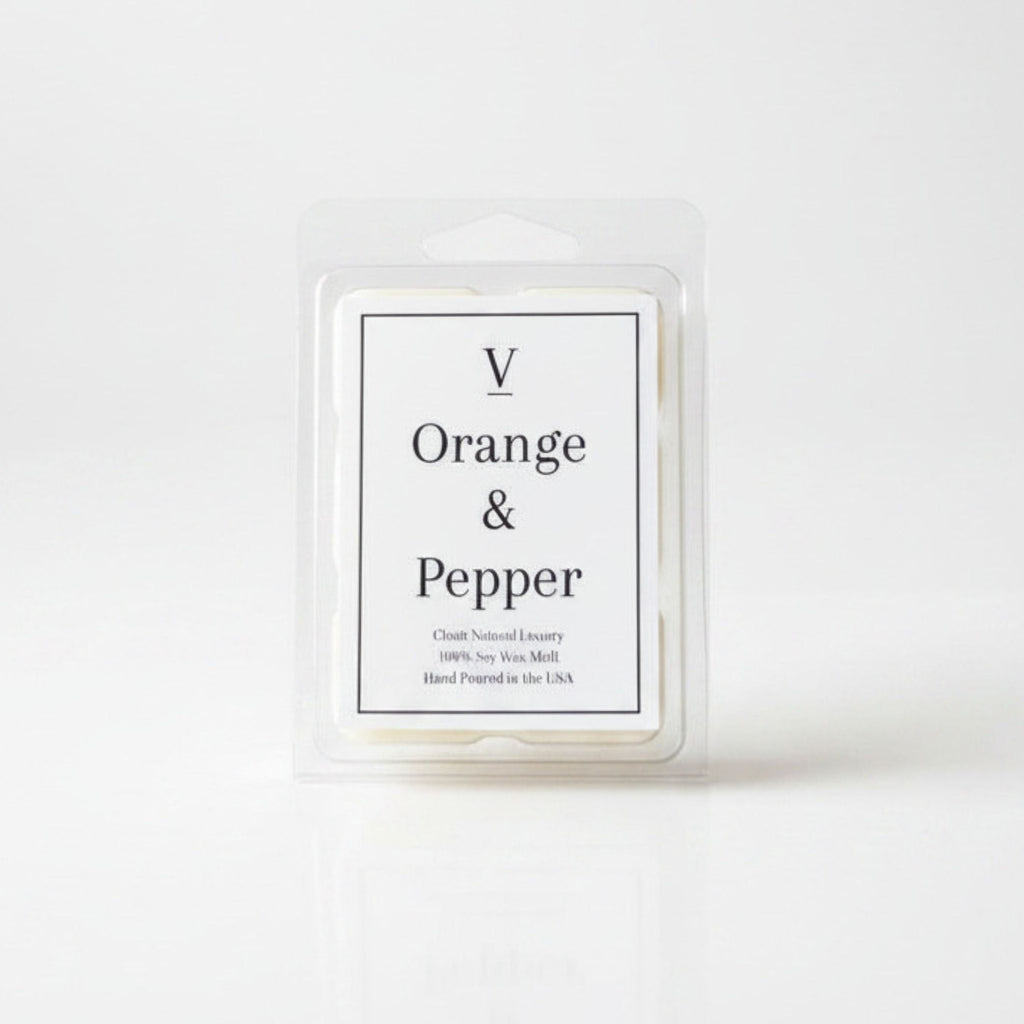 Luxury orange and pepper wax melt flameless in cozy modern home