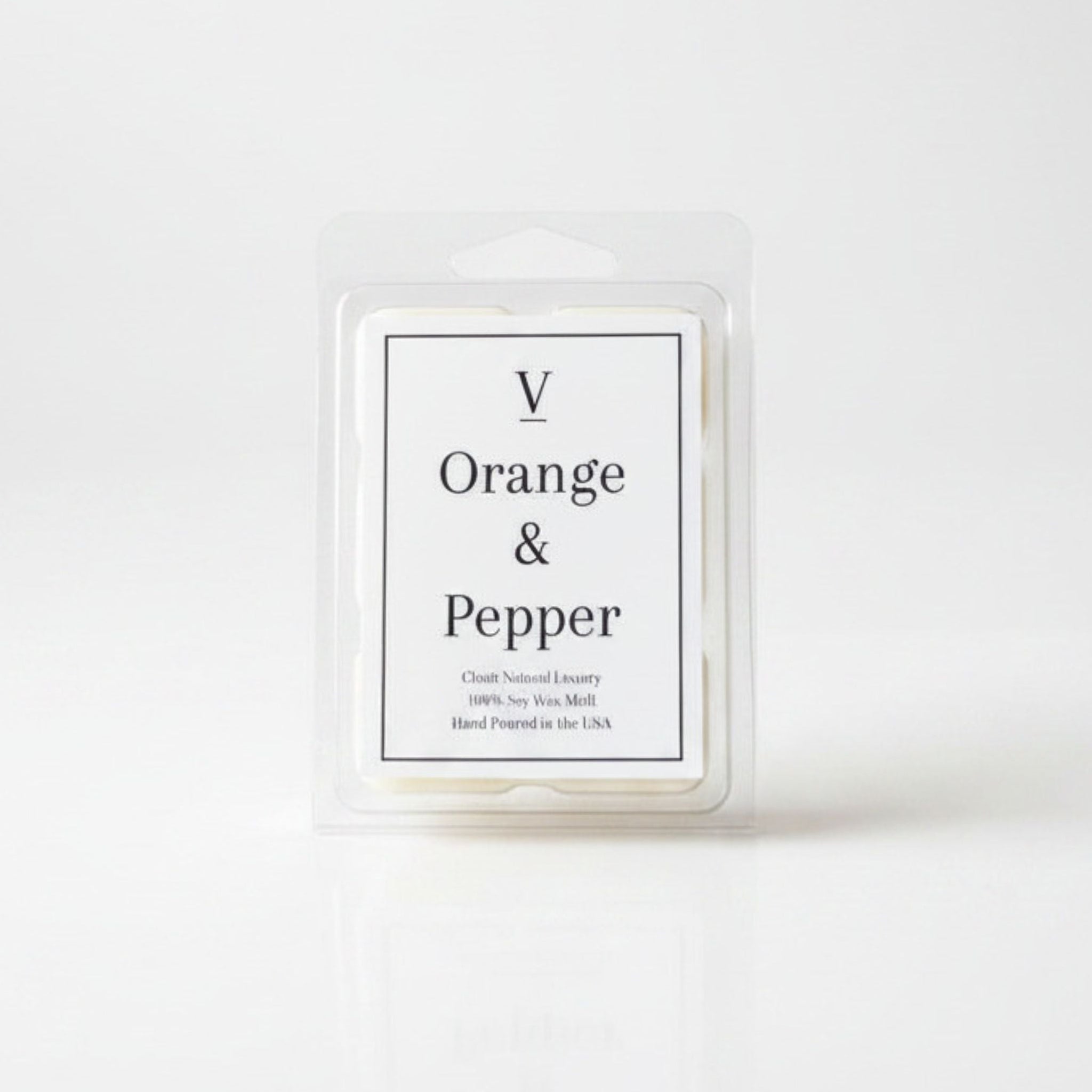 Luxury orange and pepper wax melt flameless in cozy modern home