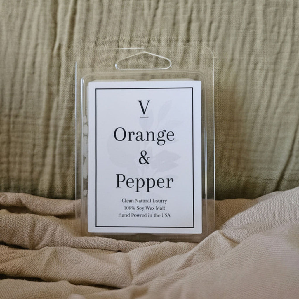 Luxury orange and pepper wax melt flameless in cozy modern home