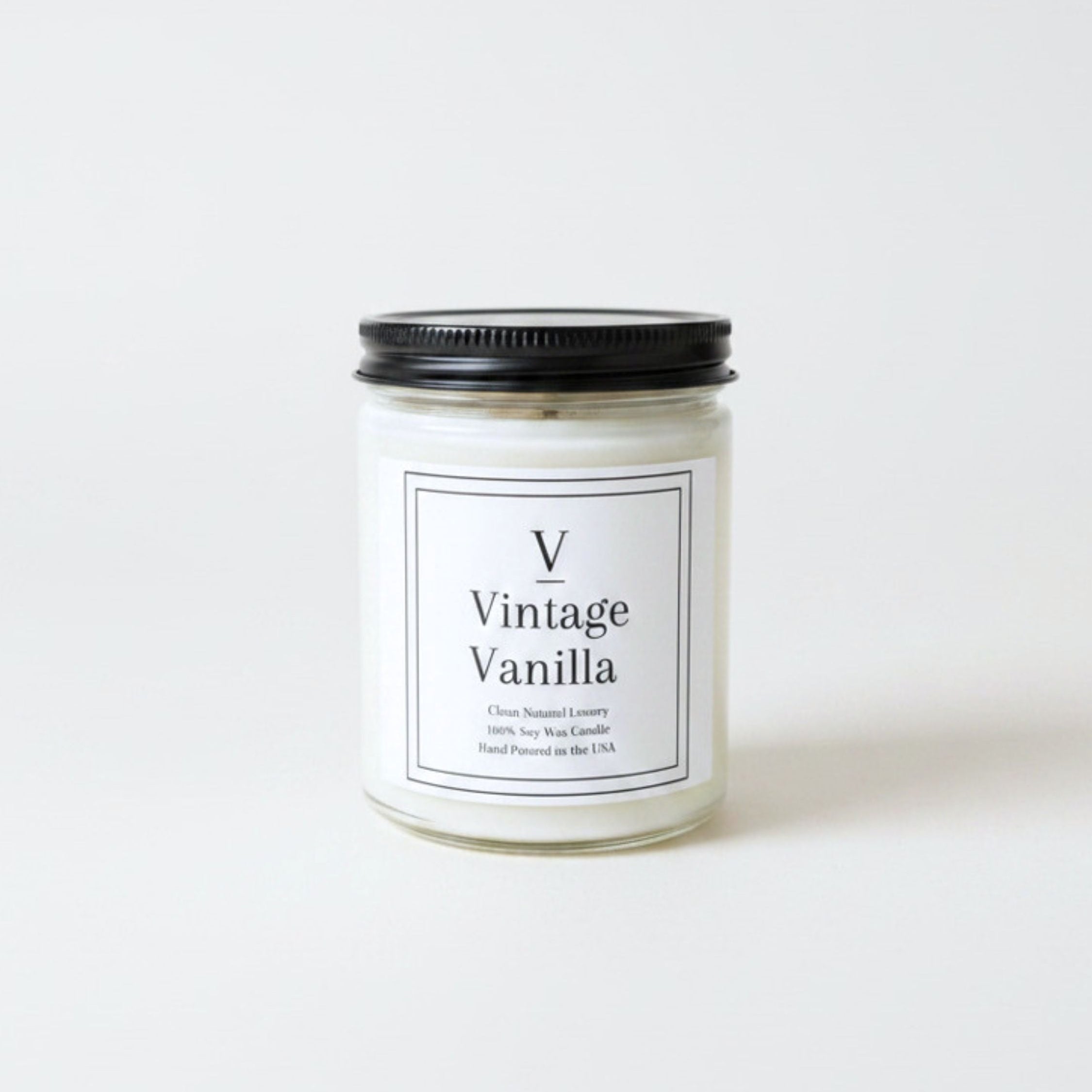 Vintage Vanilla clean soy candle in glass jar
Warm vanilla luxury candle burning cozy aesthetic
Hand poured vanilla candle minimalist design
