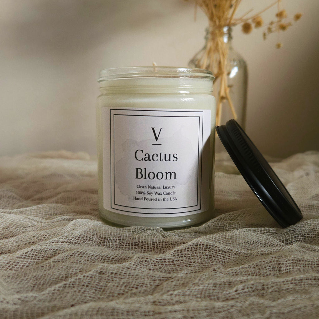 Luxury botanical candle aesthetic inspired by desert flowers and warm sunlight