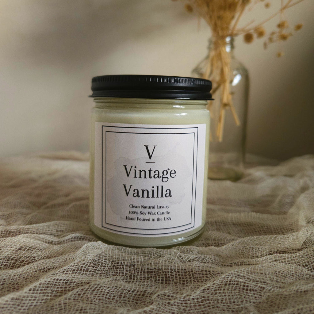 Cozy vanilla candle creating soft warm atmosphere in minimalist home