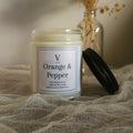 Luxury orange and pepper candle aesthetic with warm citrus home fragrance