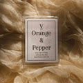 Luxury orange and pepper wax melt aesthetic with warm citrus home fragrance